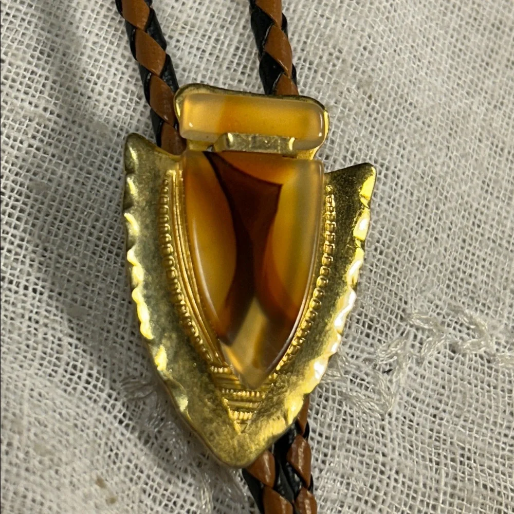 Vintage Bolo tie western leather and ornate medallion with bullet ends